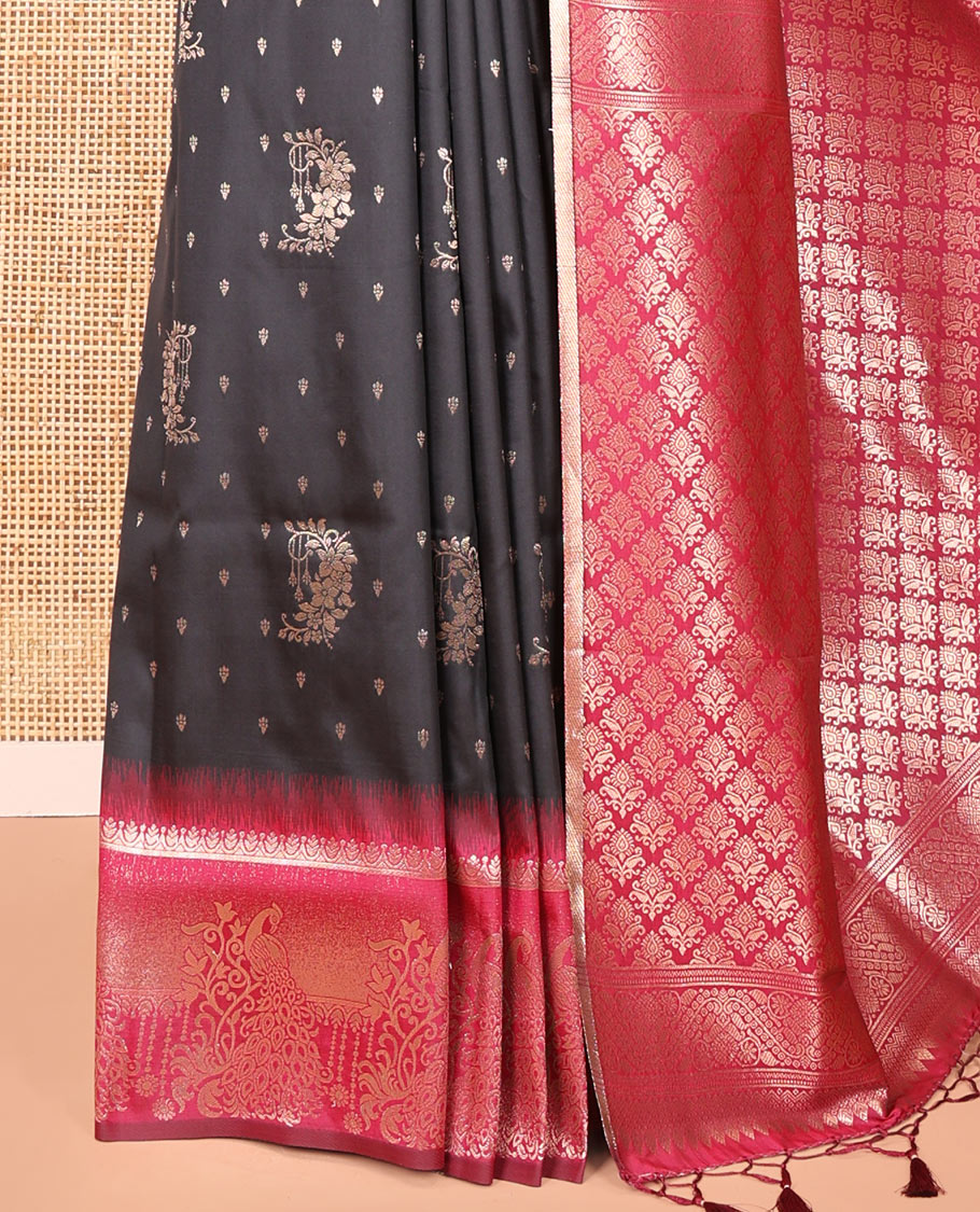 Black Elite Soft Silk Saree, Woven with Zari Buttas on Its Body, Complemented by a Contrast Peacock-Floral Zari Blouse, Intricately Designed Pallu, and Paired with a Contrast Blouse