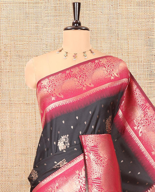 Black Elite Soft Silk Saree, Woven with Zari Buttas on Its Body, Complemented by a Contrast Peacock-Floral Zari Blouse, Intricately Designed Pallu, and Paired with a Contrast Blouse