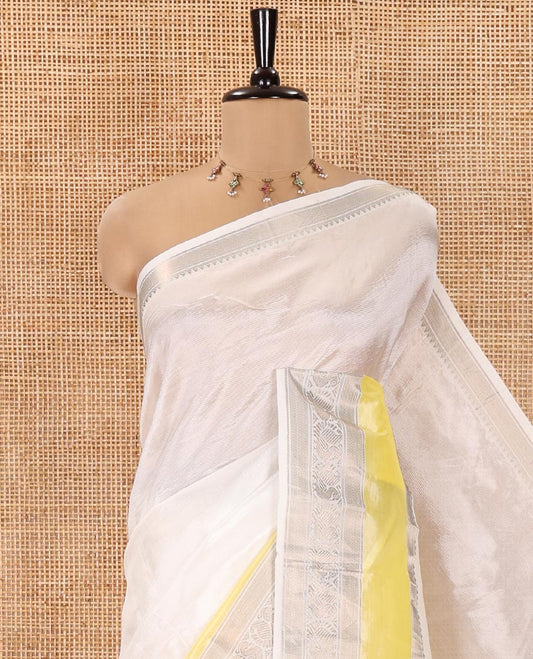 Half-White Mangalagiri Silk Saree, Sparsely Woven Stripes On Its Body, Complemented by Contrast Border of Temple and Peacock Designs, Striped Pallu and Paired with a Contrast Blouse