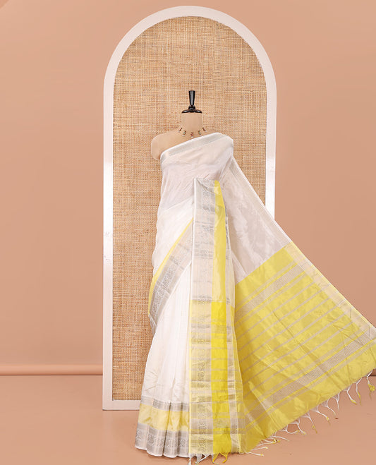 Half-White Mangalagiri Silk Saree, Sparsely Woven Stripes On Its Body, Complemented by Contrast Border of Temple and Peacock Designs, Striped Pallu and Paired with a Contrast Blouse