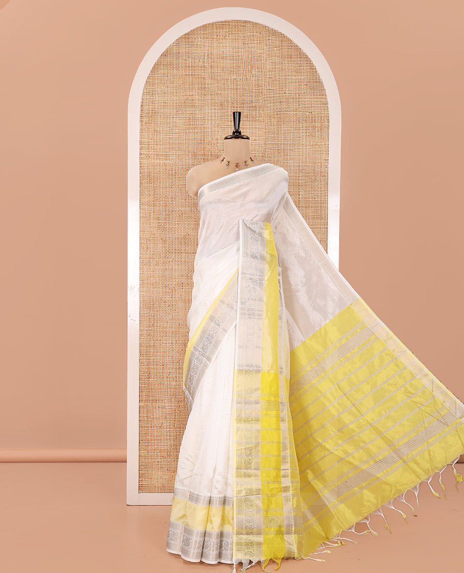 Half-White Mangalagiri Silk Saree, Sparsely Woven Stripes On Its Body, Complemented by Contrast Border of Temple and Peacock Designs, Striped Pallu and Paired with a Contrast Blouse