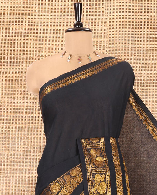 Black Plain Sungudi Cotton Saree, Highlighted by Traditional Zari Border of Peacock and Floral Creeper Designs, Subtly Striped Pallu, and Paired with a Contrast Blouse