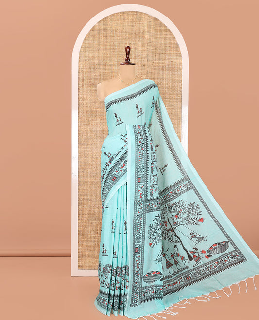 Light Rama Khadi Mul Cotton Saree, Artfully Printed with Warli Motifs All Over Its Body, Highlighted by a Self-Border of Warli Print, Pallu of Warli Print, and Paired with a Matching Blouse