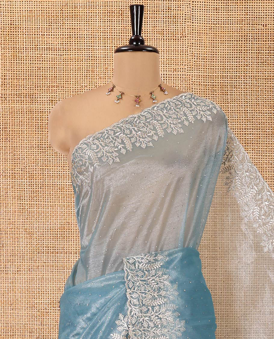 Blue Twill Net Saree, Gleamed Up with Stone Work, Highlighted by a Scallop Embroidered Border and Paired with a Matching Blouse
