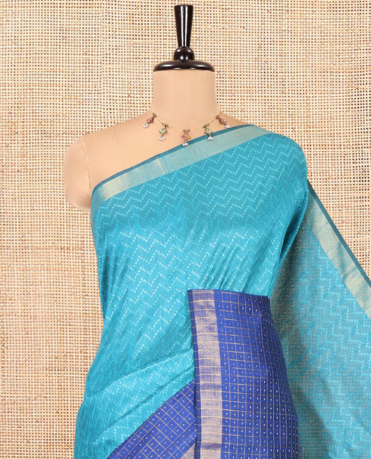 Rama Blue Semi-Raw Silk Saree, Delicately Woven with Zig-Zag Stripes All Over Its Body, Complemented by Contrast Border of Butta Enclosed Checks, Striped Pallu, and Paired with a Contrast Blouse