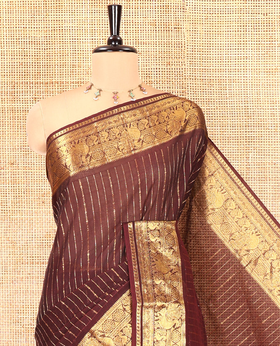 Brown Chettinad Cotton Saree, Spotlighted with Zari Stripes, Traditional Peacock-Chakram Border, Traditional Pallu, and a Matching Blouse
