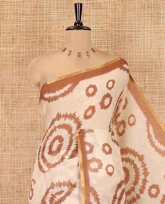 Cream-Brown Linen Cotton Saree, Adorned with Shibori Print, Contrast Piping Border, Kalamkari Floral Vine Pallu, and a Contrast Blouse