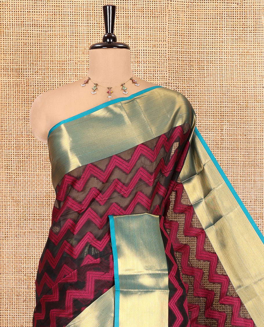 Black Semi-Organza Saree Features Pochampally Ikat Chevron Stripes, a Contrast Border, Paisley Pallu, and Contrast Blouse