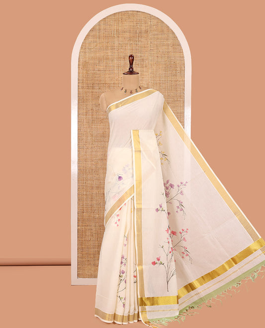 Cream Kerala Cotton Saree, Beautified with Floral Print, a Zari Border, Floral Pallu, a Contrast Blouse