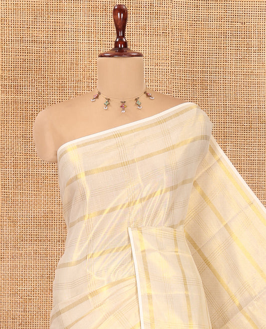 Borderless Gold Kerala Tissue Saree, Gleamed Up with Zari Checked Design, a Self-Pallu, and a Matching Blouse