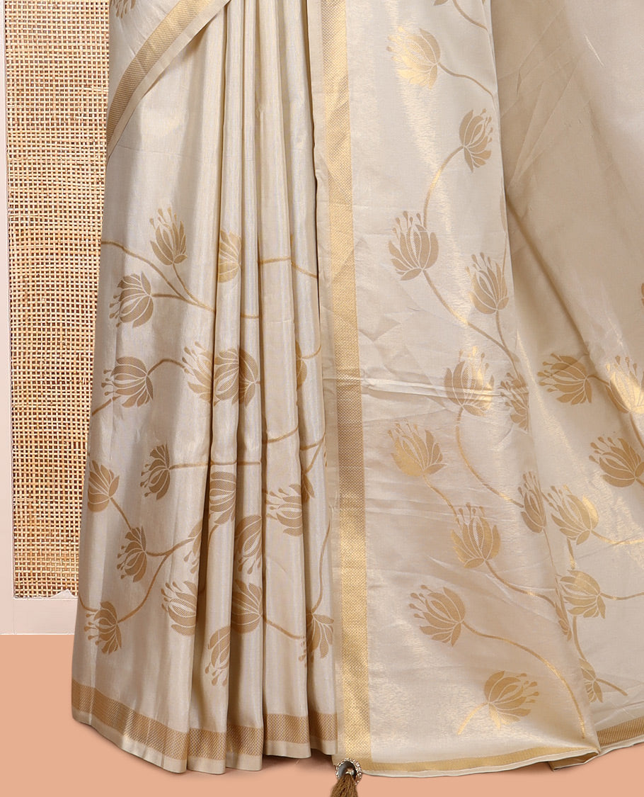 Gold Tissue Saree Highlighted by Lotus Vine Designs, a Zari Border, Matching Blouse