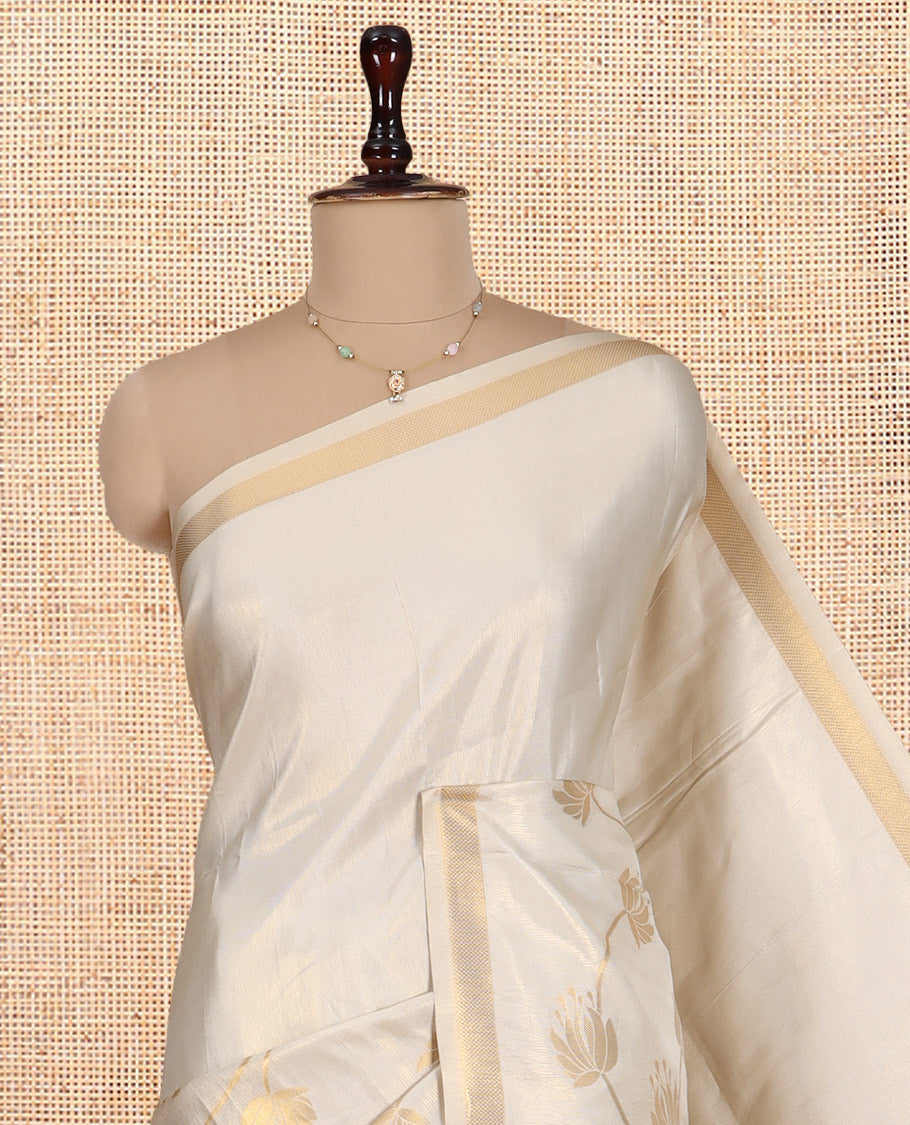 Gold Tissue Saree Highlighted by Lotus Vine Designs, a Zari Border, Matching Blouse