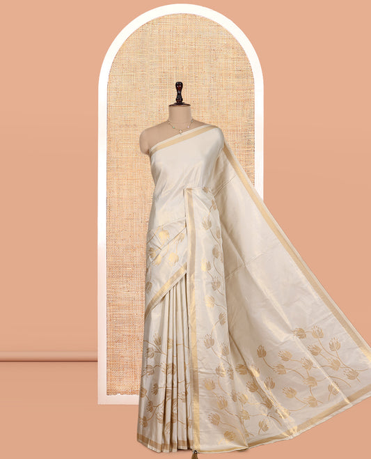 Gold Tissue Saree Highlighted by Lotus Vine Designs, a Zari Border, Matching Blouse