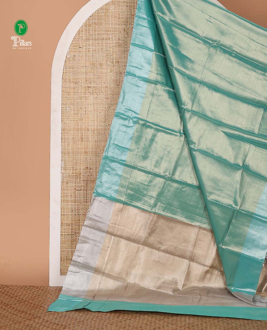 Rama blue plain tissue silk saree, silver zari bavanji border & contrast, gleaming golden color plain blouse