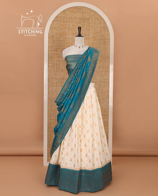 Cream semi-banaras half-saree, zari buttas & contrast Swarovski stonework traditional border skirt, jacquard blouse & contrast jaal jacquard blue dhavani