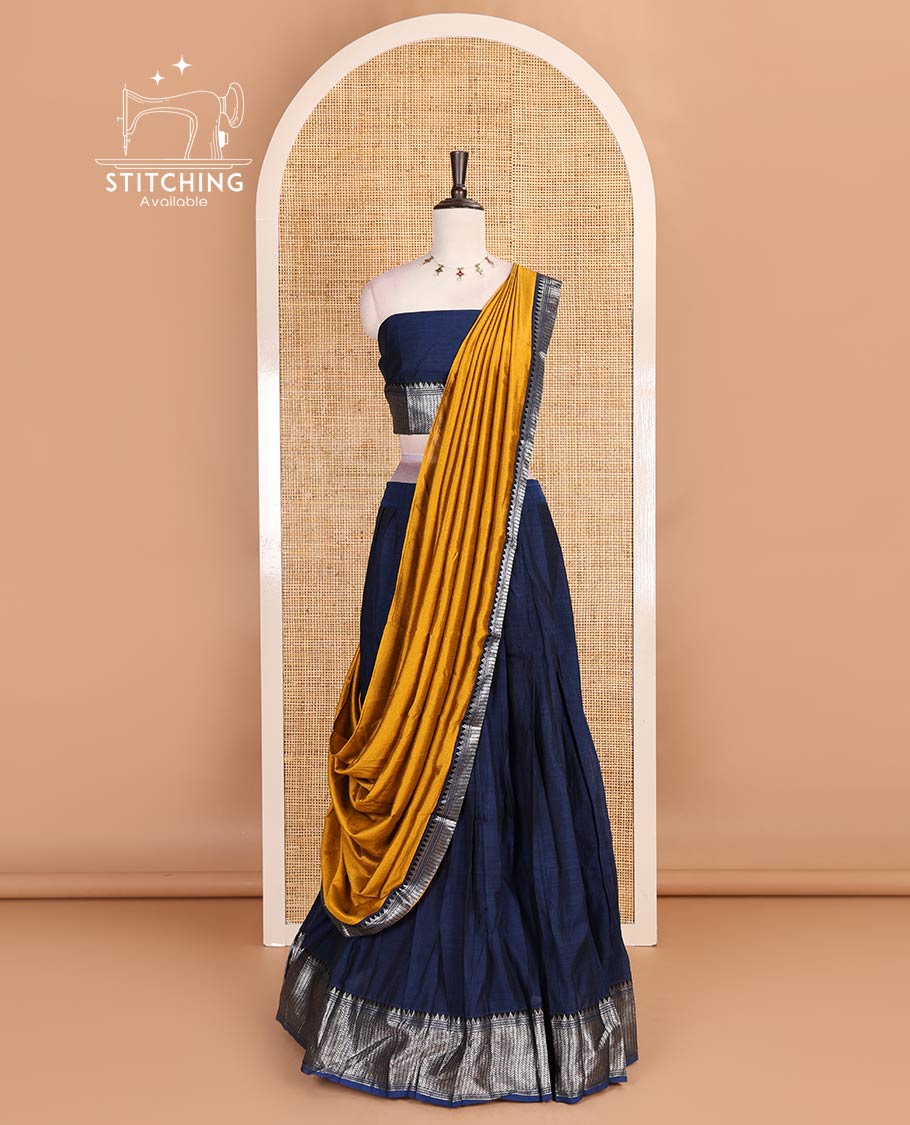 Navy blue-mustard Mercerised cotton half-saree, plain & contrast temple geometric border skirt, matching blouse & contrast zari border Vichitra silk dhavani