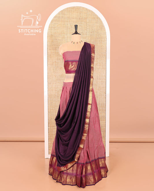 Onion Pink-Magenta Chettinad Cotton Half-Saree Featuring a Plain Skirt, Highlighted with a Contrast Peacock-Elephant Motifs Woven Rettai Pettu Zari Border, a Subtly Woven Matching Blouse, and a Vichitra Silk Contrast Traditional Zari-Bordered Dhavani