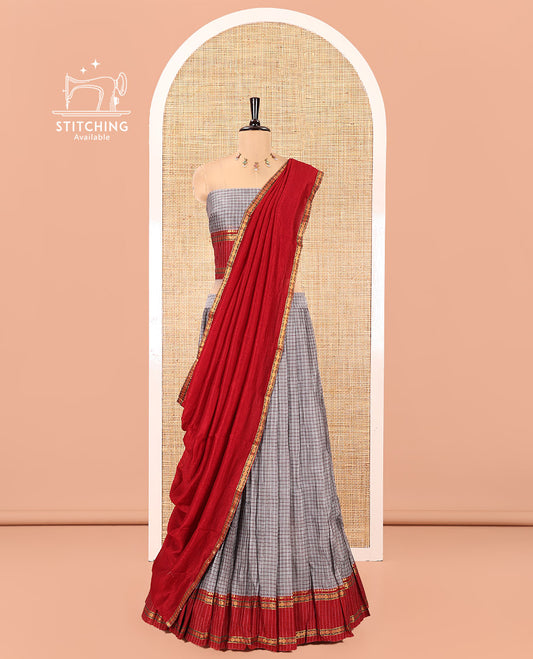 Grey and Red Sungudi Cotton Half-Saree, Elevated with Checked Design with Contrast Traditional Design Rettai Pettu Bordered Skirt, Comes with a Matching Blouse, and Is Paired with a Contrast Dhavani