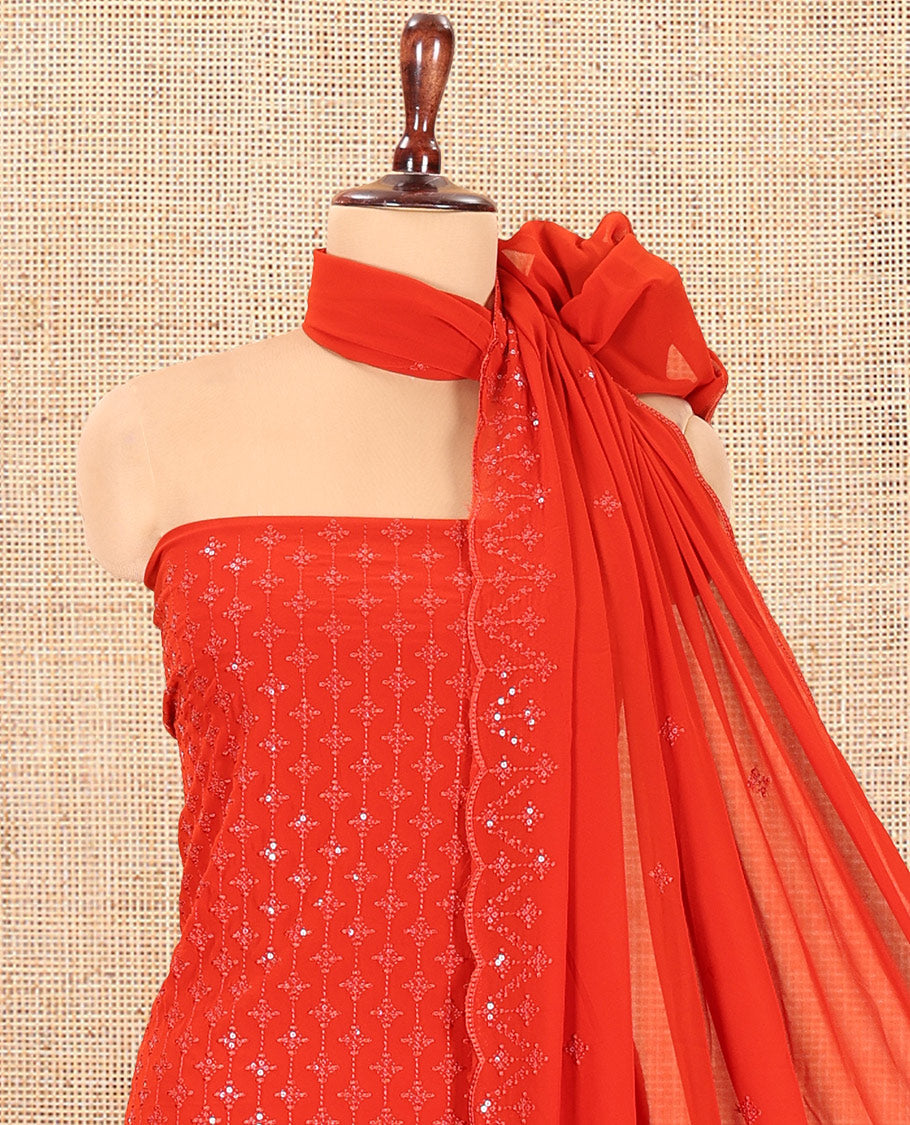 Rust Georgette Material Churidar, Woven with Sequins Embroidered Top, a Matching Bottom, and Embroidered Dupatta