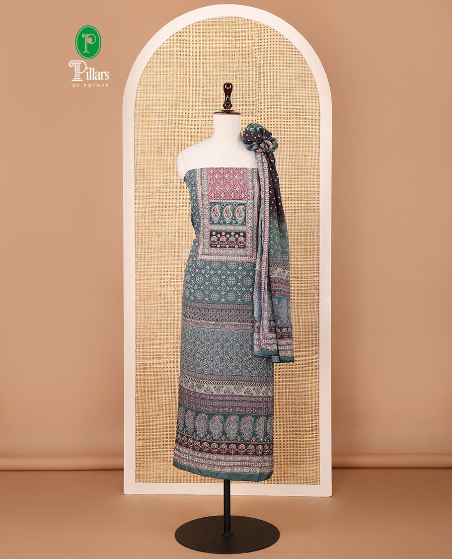 Bottle green crepe chudidar material set, ajrakh-print with daman floral design top, plain bottom & dupatta of bandhani dots & ajrakh-style print