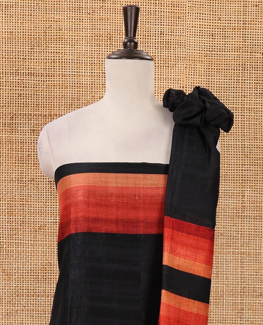 Black material chudidar set, horizontal red ombre striped semi-tussar top, plain santoon bottom & horizontal red ombre striped dupatta with tassels