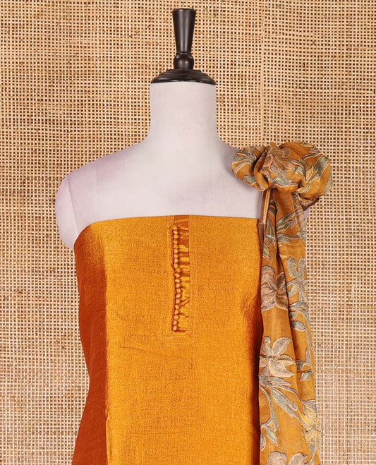 Mustard material chudidar set, plain with fancy thermacol balls neck work Vichitra top, cotton bottom, and floral printed dupatta