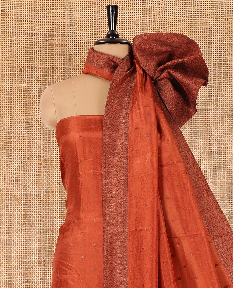 Rust material chudidar set, copper zari buttas and jaal design semi-modal silk top, plain santoon bottom, and zari design woven semi-modal silk dupatta