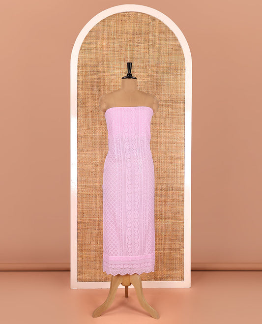 Light pink material chudidar set, paisleys and jaal schiffli sequins embroidered mul georgette top, a matching bottom, and a mirror work dupatta