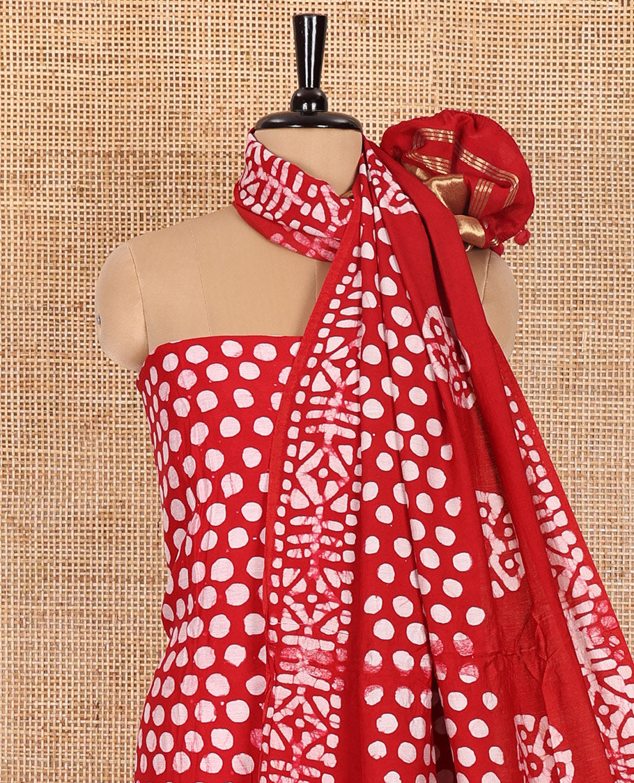 Red maroon material chudidar set, polka dots batik printed modal chanderi top, batik motifs printed bottom, and a batik motifs printed modal chanderi dupatta