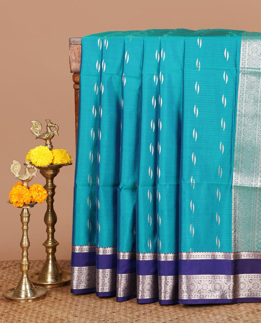 Peacock green zari butta semi soft silk saree with rettai pettu, diamond border grand pallu along with plain blouse