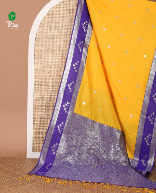Yellow floral zari buttas semi-soft silk saree, contrast traditional motif zari border & pallu of paisleys & checks