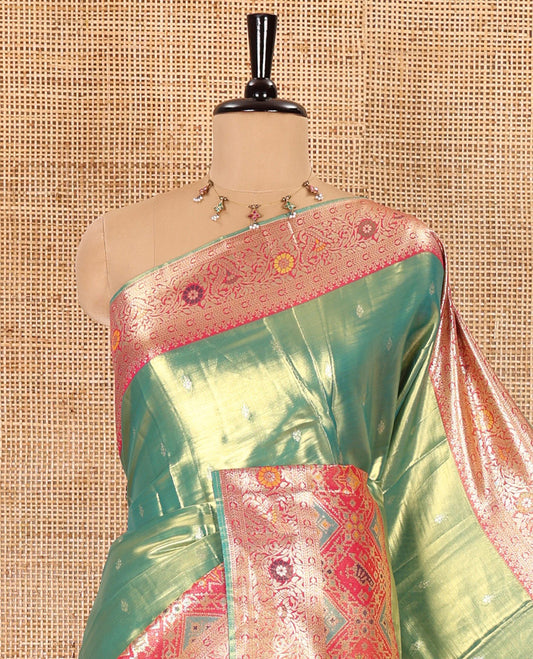 Rama green zari buttas tissue silk saree, contrast border of patola design and traditional motifs, jaal pallu, and a matching blouse