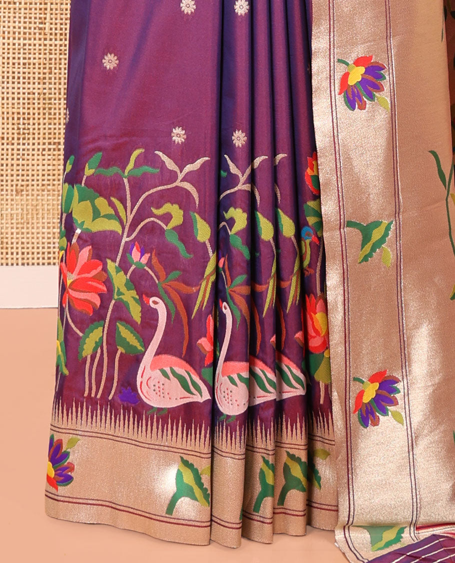 Purple Paithani Art Silk Saree, Embellished with Flower Buttas All Over Its Body, Highlighted by Zari Temple Border Pictures Colorful Flora-Fauna Designs, Pallu Depicts Colorful Floral and Bird Designs, and Paired with a Matching Blouse