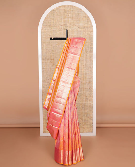 Orange jacquard silk saree with self border of thilakam mokku, muthu, banaras design & floral design pallu