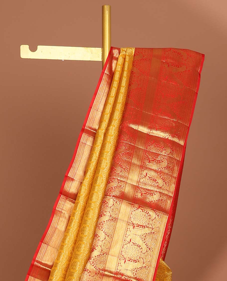 Yellow flower enclosed in hexegon design silk saree with contrast border of rekku,mayil,muthu, banaras design & intricate zari pallu