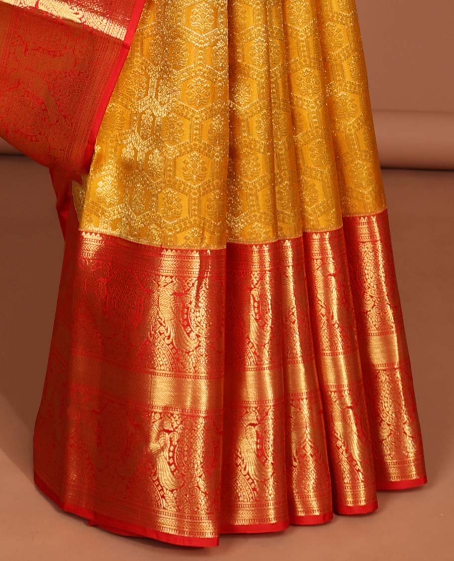 Yellow flower enclosed in hexegon design silk saree with contrast border of rekku,mayil,muthu, banaras design & intricate zari pallu