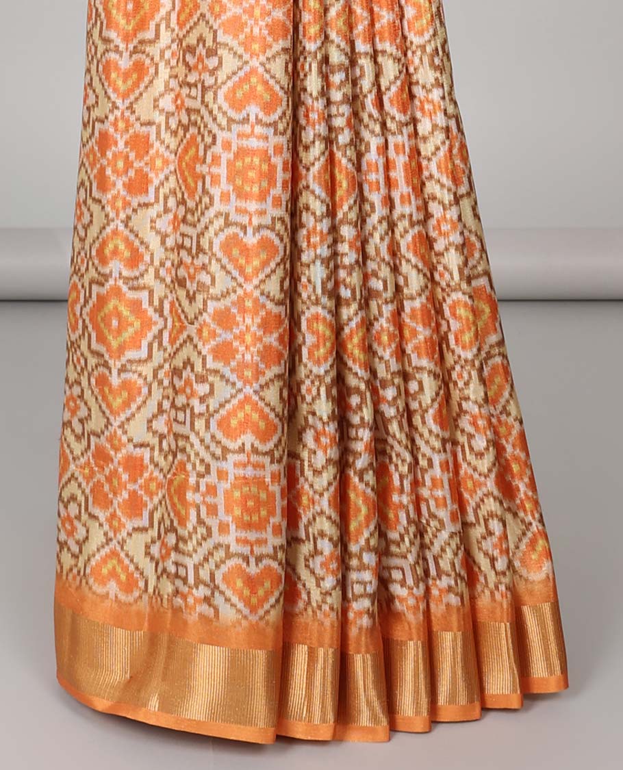 Cream ikkat style floral design tissue saree with contrast zari border & zari design pallu