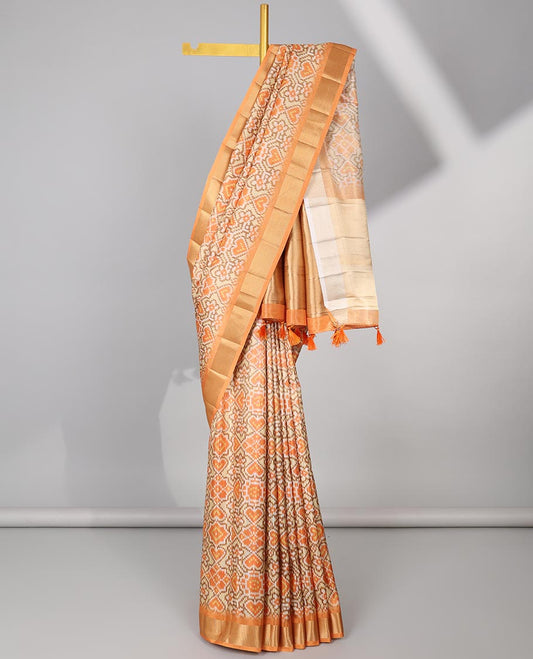 Cream ikkat style floral design tissue saree with contrast zari border & zari design pallu