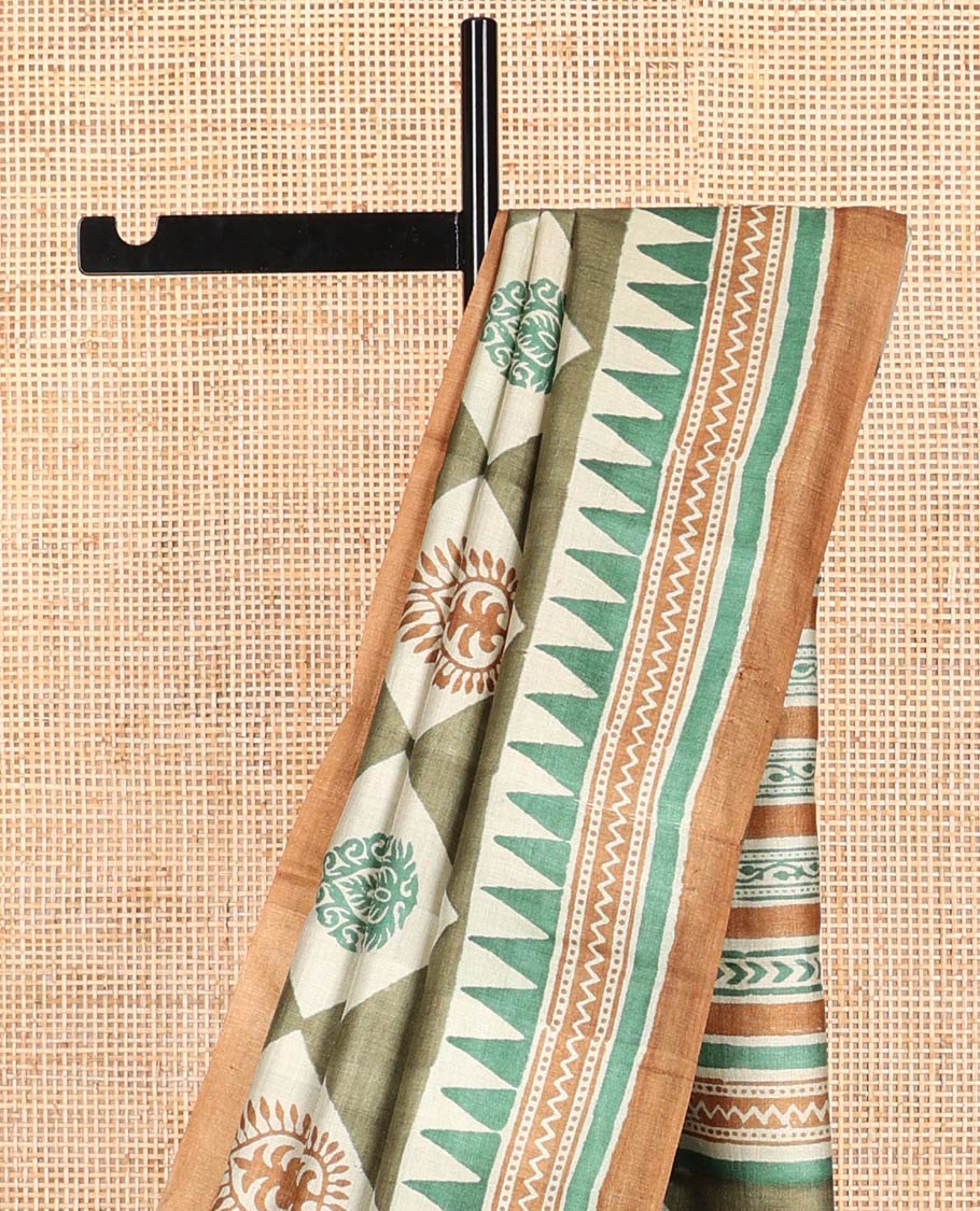 Olive green block floral print tussar saree with contrast geometric design border & floral design pallu