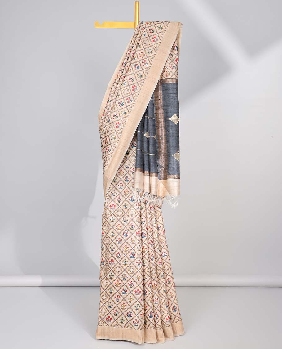 Cream floral enclosed with argyle design tussar silk saree with self-border & striped design pallu