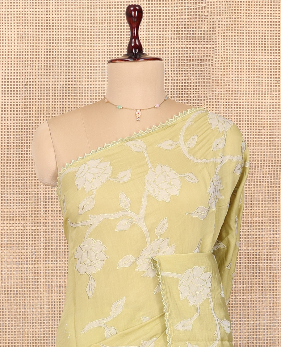Pale Green Tussar Silk Saree, Prettified with Floral Vine Embroidery, Lace Border, and a Matching Blouse