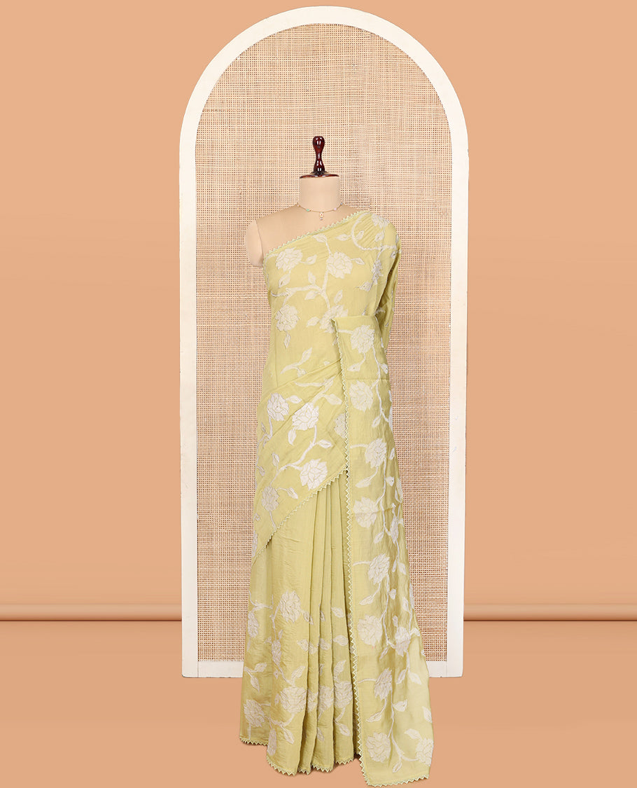 Pale Green Tussar Silk Saree, Prettified with Floral Vine Embroidery, Lace Border, and a Matching Blouse