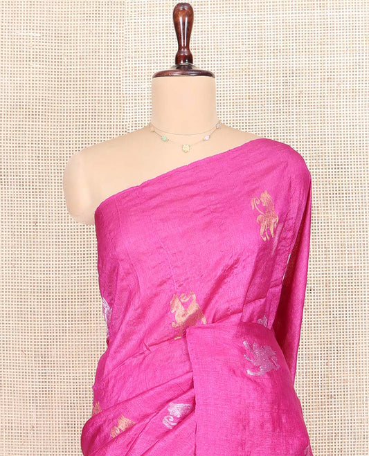 Borderless Rani Pink Tussar Silk Saree Illustrating Mythological Animal Motifs Woven in Zari on Its Body, Pallu Highlighted by Animal-Human Motifs in Zari, and Paired with a Matching Blouse