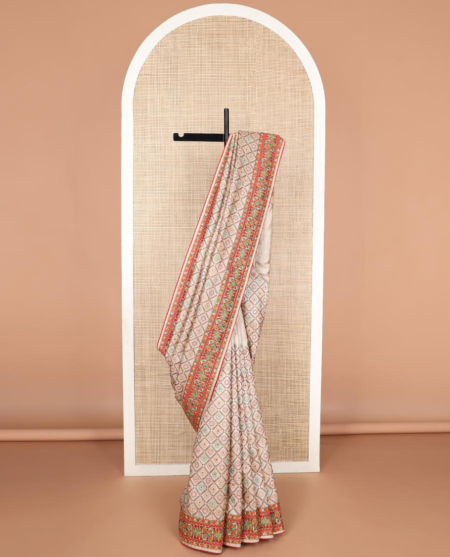 Cream thread embroidery, mirror work tussar silk saree with embroidery border & floral thread embroidery pallu