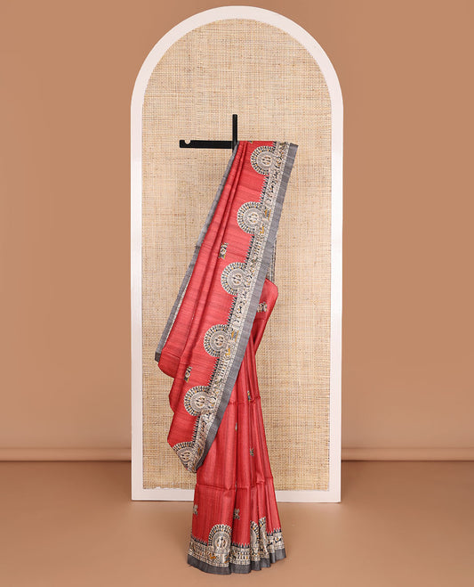 Red madhubani-style human motifs printed tussar saree, contrast border & pallu elevated with madhubani-themed motifs