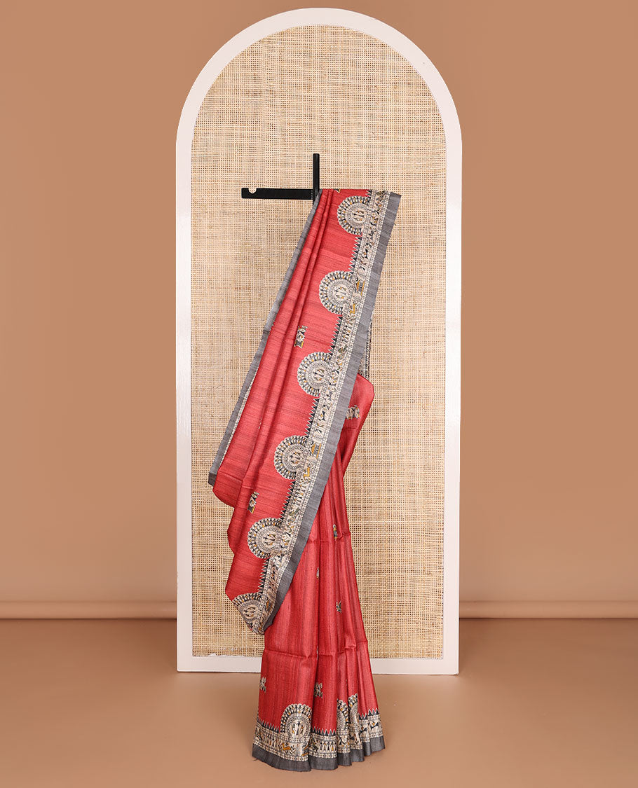 Red madhubani-style human motifs printed tussar saree, contrast border & pallu elevated with madhubani-themed motifs