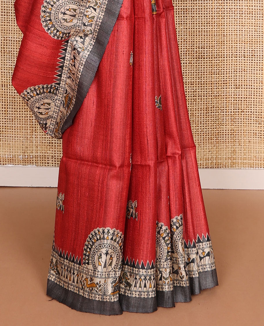 Red madhubani-style human motifs printed tussar saree, contrast border & pallu elevated with madhubani-themed motifs