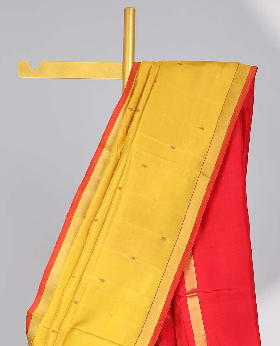 Yellow motifs uppada silk saree with contrast zari border & floral vine design pallu