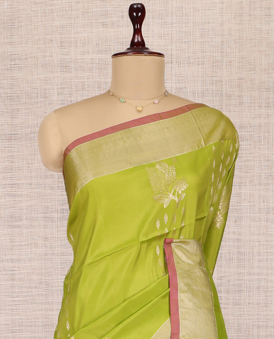 Green Uppada Saree, Elevated with Floral Zari Buttas, a Bavanji Border, Grand Jaal Pallu, and a Contrast Blouse