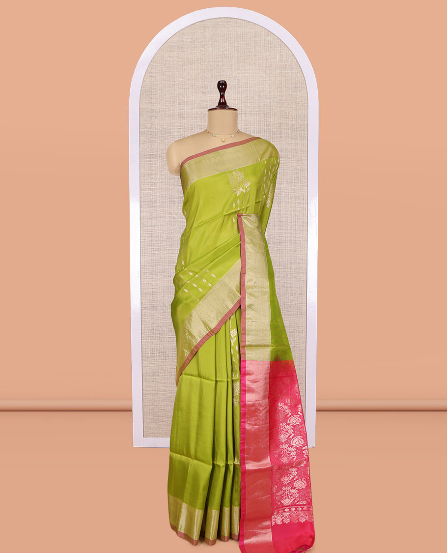 Green Uppada Saree, Elevated with Floral Zari Buttas, a Bavanji Border, Grand Jaal Pallu, and a Contrast Blouse